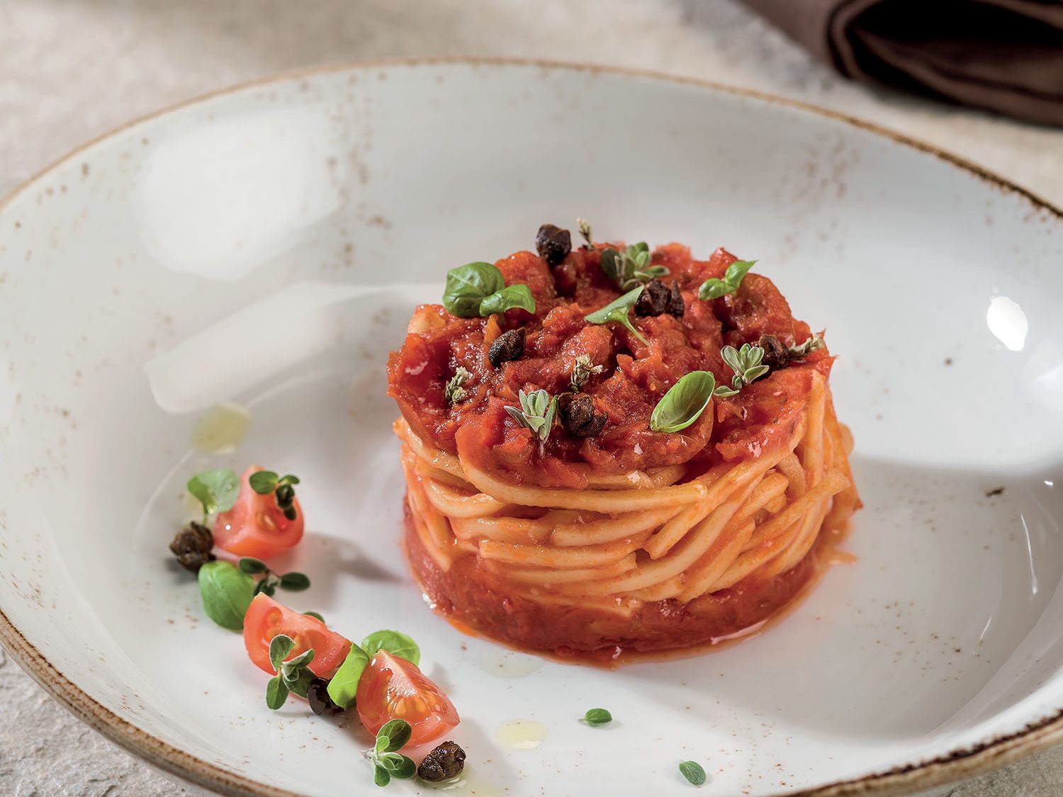 Spaghetti alla Chitarra con fonduta di pomodoro pachino e profumi mediterranei