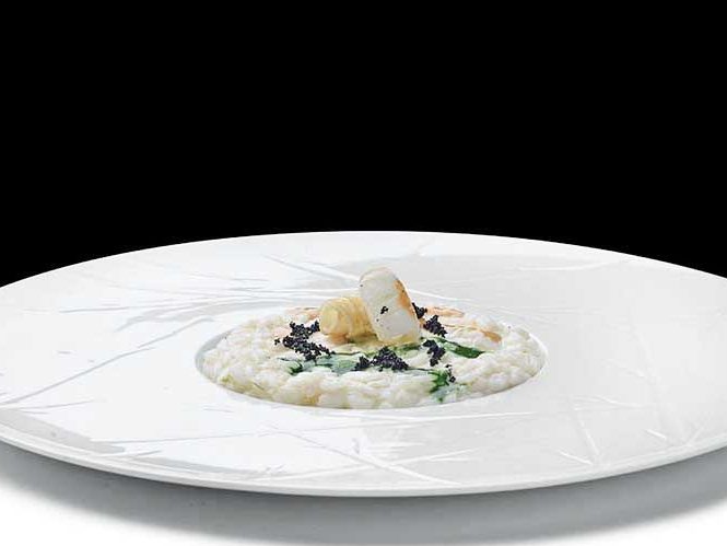 risotto con datterino giallo IGP, vongole affumicate e salicornia