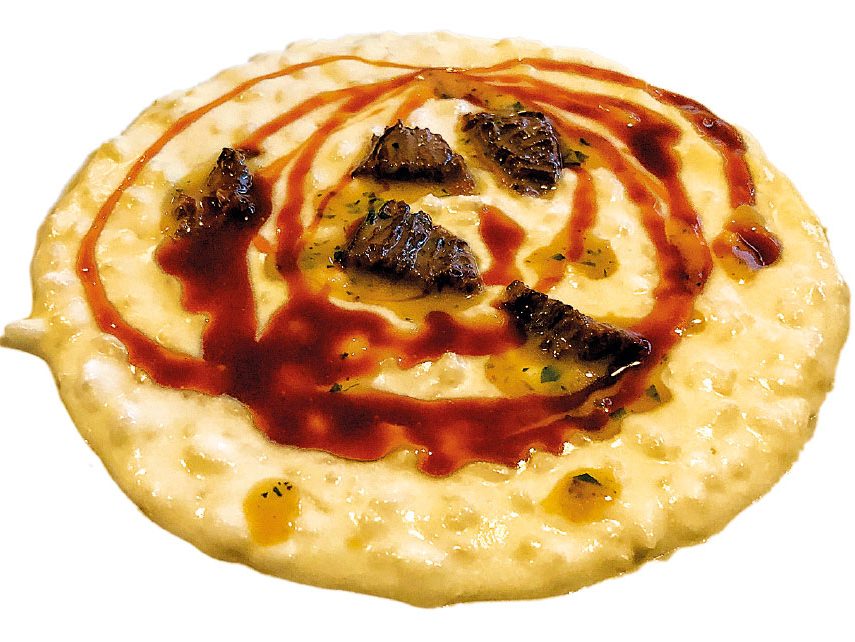 Risotto, prescinseua, jus di piccione e spugnole: un piatto dello chef Valerio Braschi per il ristorante 1978 di Roma